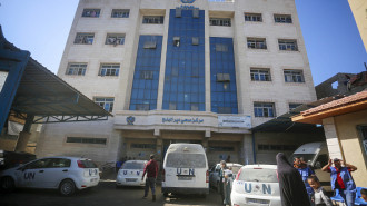 Palestinians wait in line at a United Nations Relief and Works Agency (UNRWA) clinic in Deir al-Balah to receive medication and medical treatment as Israel's attacks on Gaza continue, creating harsh living conditions for the residents, on October 29, 2024. 