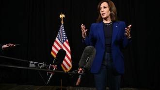 Democratic presidential nominee, US Vice President Kamala Harris speaks to members of the media before leaving her hotel in Madison, Wisconsin