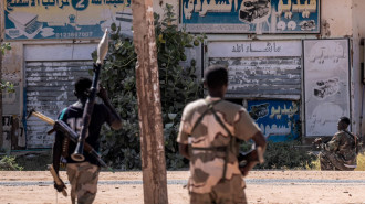 Sudanese army soldiers patrol an area in Khartoum North