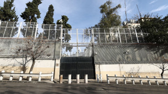 This picture shows a gated entrance to a building, that used to house the US embassy, in the capital Damascus