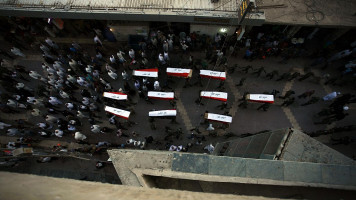 Coffins of members of Iraq's military killed in the Speicher massacre