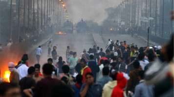 Demonstrators protest against Rabaa massacre