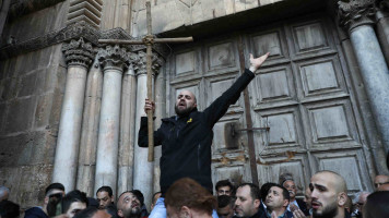 Palestinian man protests outside Church of the Holy Sepulchre