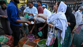 kashmir curfew food queue getty