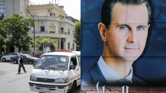 Assad poster [Getty]