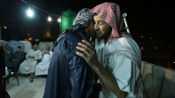 english site maqdisi hugging a dude getty