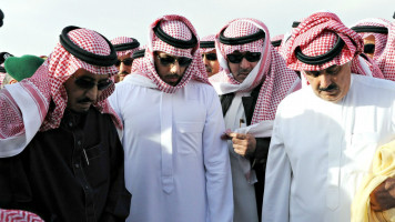 Salman (left) at the funeral of Abdullah (Anadolu)