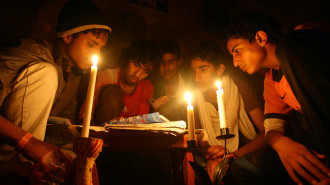 Yemeni students candlelight AFP