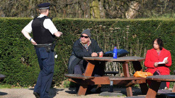 coronavirus police in park - Getty