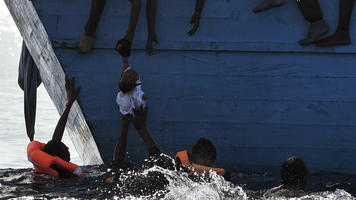 child migrant water libya afp