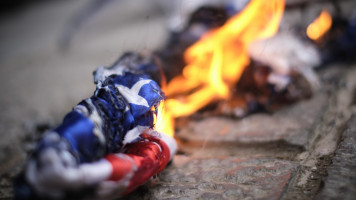 Iran burn USA flag [NurPhoto/Getty]