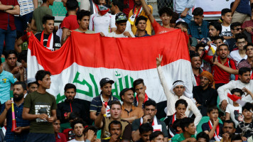 Iraq football fans -- AFP