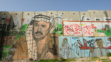 Arafat graffiti separation wall - Getty