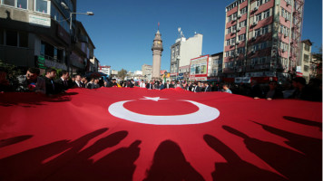 A giant Turkish flag at an Istanbul protest [Getty]