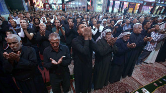 Iraq Karbala Shia praying Englishsite AFP