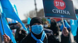 Uighurs protest [GETTY]