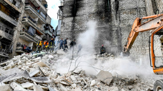 Syrian civil defence workers -- AFP