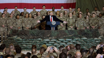 Trump and troops in Afghanistan - Getty