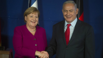 Merkel Netanyahu -- Getty