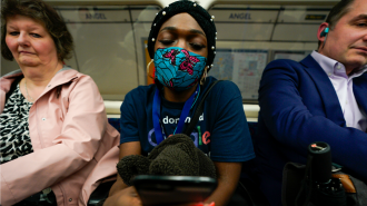 Woman on tube - Getty