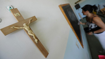 Crucifix at school - AFP