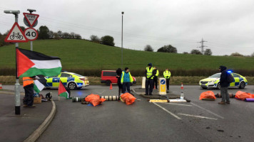 BDS JCB protest - activists