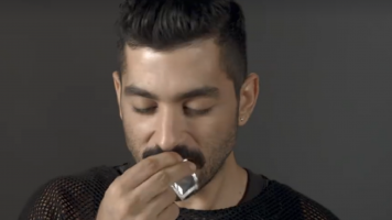 Hamed Sino showing how not open a condom [Facebook]