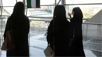 uae woman girl abaya