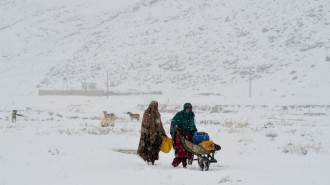 Women in snow-covered Quetta, Pakistan [Getty]