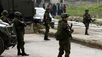 Russian soldiers in Syria [AFP]