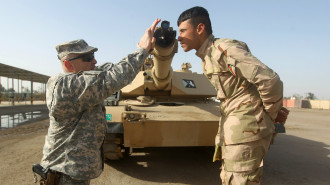 US soldier training Iraqi soldier