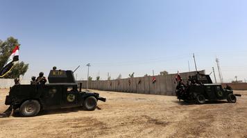 Iraqi forces in action - AFP