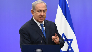 Netanyahu speaks at a press conference at European Council