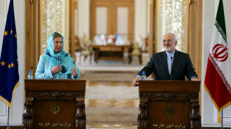 Mogherini and Zarif - AFP