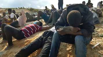 Migrants beach [Getty]