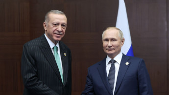 Erdogan (left), Putin (right)