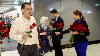 Turks arriving back in Istanbul after their evacuation from Sudan