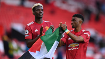 Paul Pogba and Amad Diallo