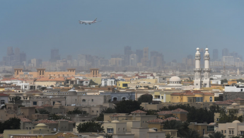 Plane flies over Dubai