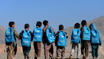 Afghan children walk to school on the outskirts of Herat [Getty]