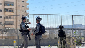 Israeli soldiers patrol the entrance of the Shuafat Refugee Camp in occupied East Jerusalem.