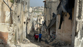  "The Israeli troops bulldozed down the roads and alleys, and they destroyed houses in the camp, unconcerned that families are living in these houses," according to a resident.