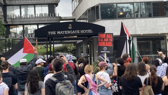 Demonstrators protest at the Watergate Hotel where Israeli Prime Minister Benjamin Netanyahu is staying during his US visit. [Brooke Anderson/TNA]