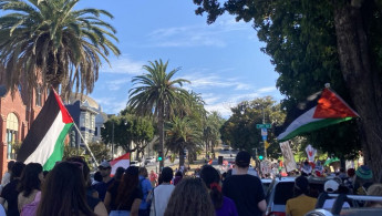 US Protesters gather to mark one year since Israel's war in Gaza began. [Brooke Anderson/TNA]