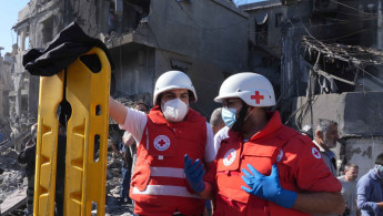 Lebanese Red Cross paramedics in rescue operation after deadly Israeli strike in Jnah, south of Beirut