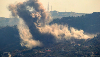 Smoke billows from a south Lebanon village following an Israeli strike.