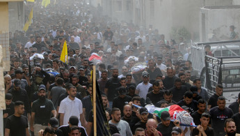 Mourners carry the bodies of Palestinians killed during an Israel raid in the northern part of occupied West Bank, during a group funeral procession in the Jenin refugee camp.