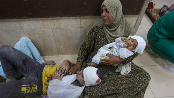 Injured Palestinians including children receive medical care at Aqsa Hospital following an Israeli attack hit the house of Dawas family in Deir al Balah, Gaza on September 22, 2024. (Photo by Ashraf Amra/Anadolu via Getty Images)