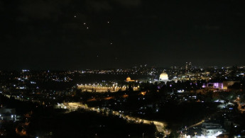 Rockets fired from Iran to Israel are seen over Jerusalem