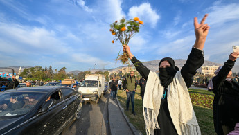 Syrian woman end of Assad [Getty]